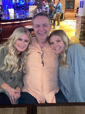 a dad and his two girls '